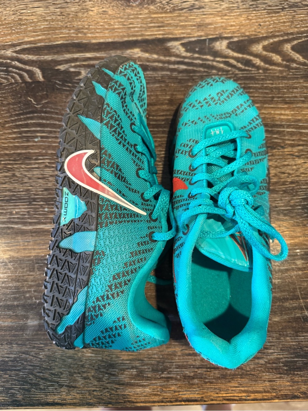 Nike Kids Teal Athletic Sneakers with Red Swoosh